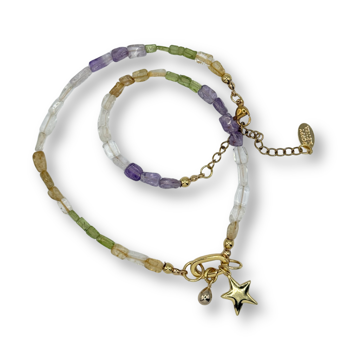 Multicolored beaded bracelet with star charm on a white background
