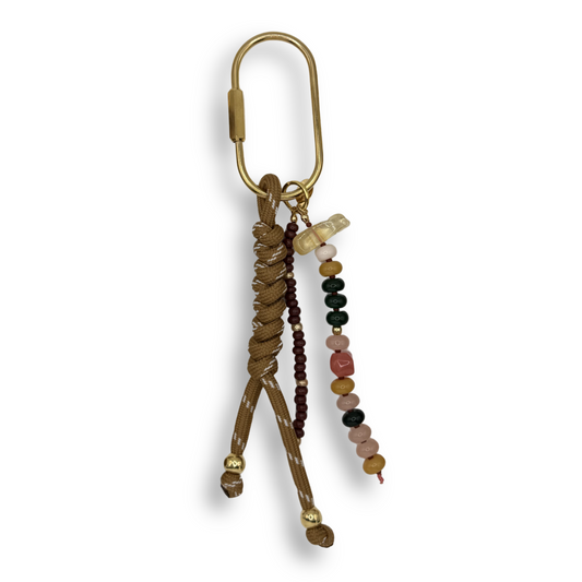 Beaded keychain with a gold clasp on a white background
