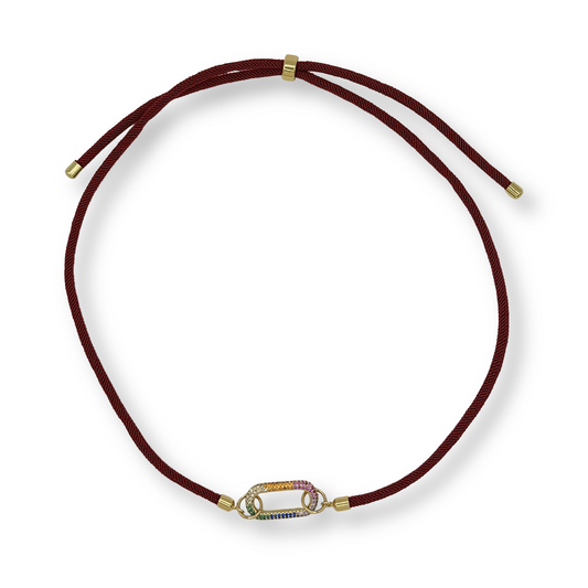 Brown cord necklace with a gold clasp on a white background