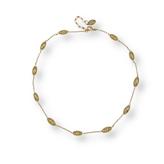 Gold necklace on a white background