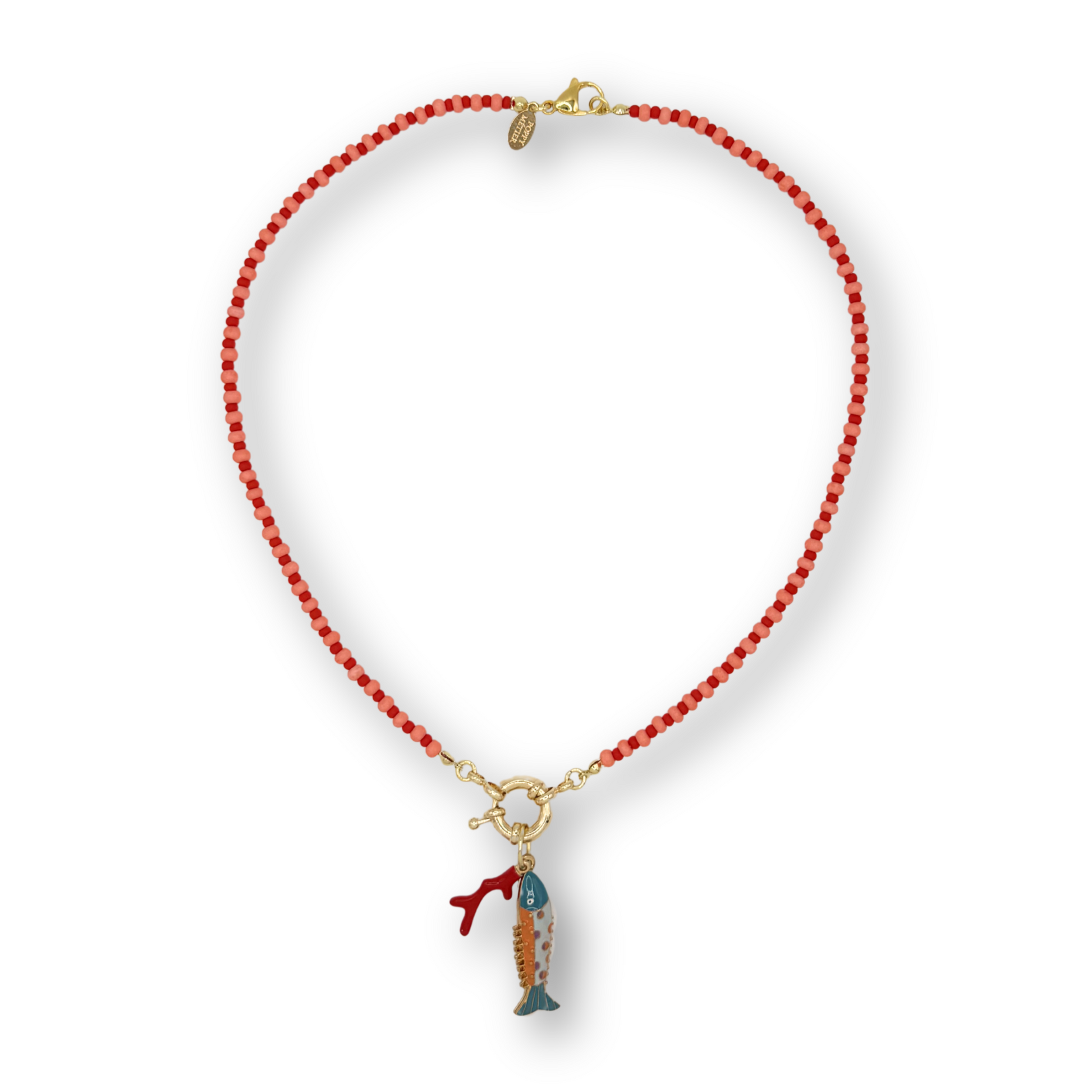 Red beaded necklace with a small pendant on a white background