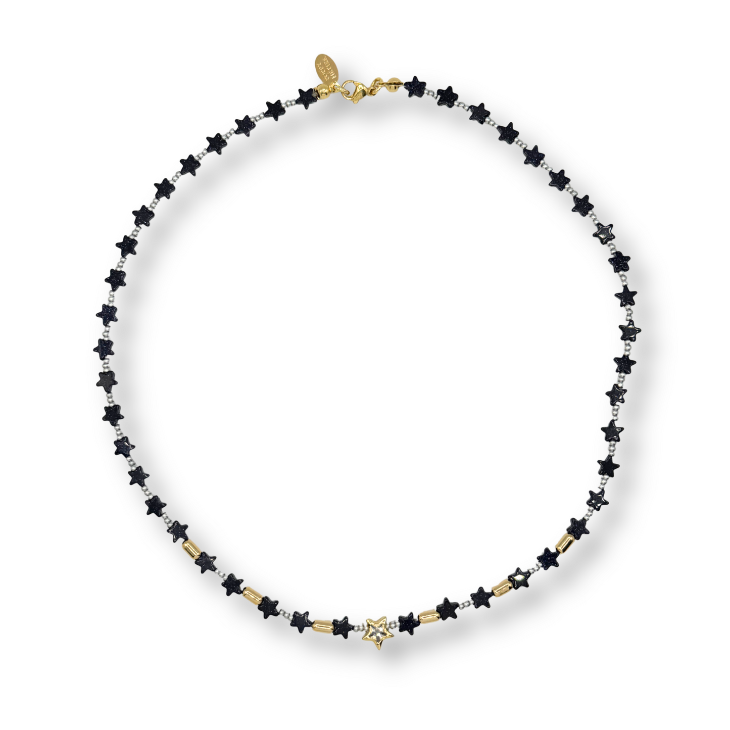A delicate necklace featuring small black star-shaped beads set in gold-toned metal, with a small gold charm at the center and a gold clasp, displayed on a clean white background.