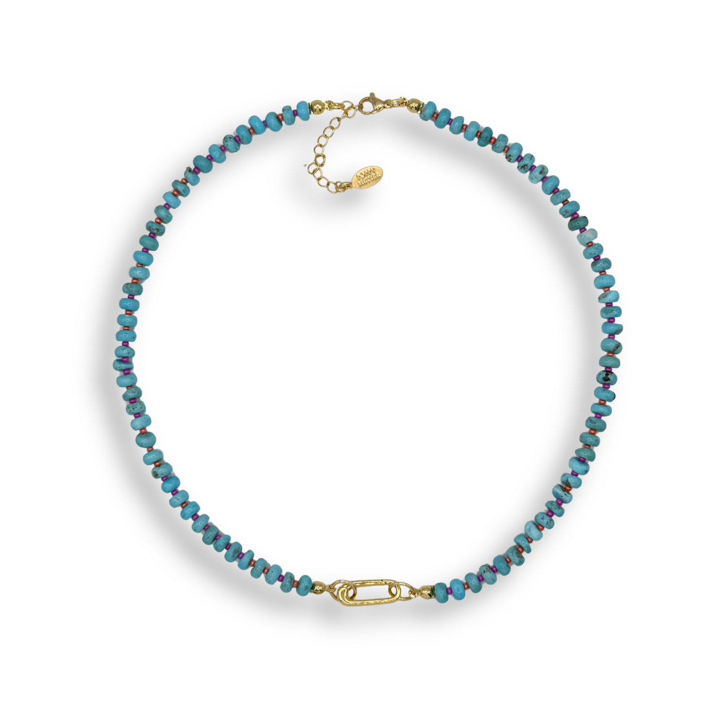 A delicate beaded necklace with small faceted turquoise-blue beads and gold-tone hardware, including a lobster clasp and extender chain, displayed on a clean white background.