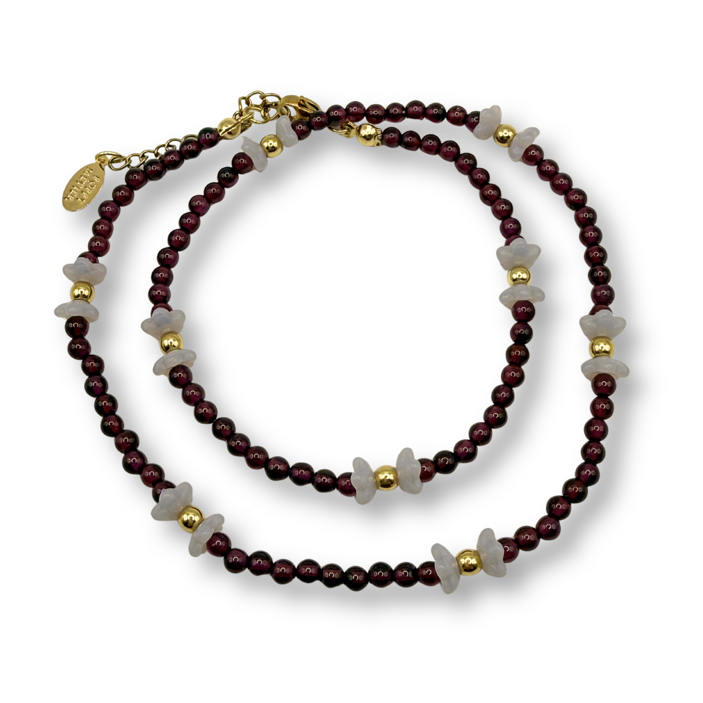 beaded necklaces with gold accents on a white background